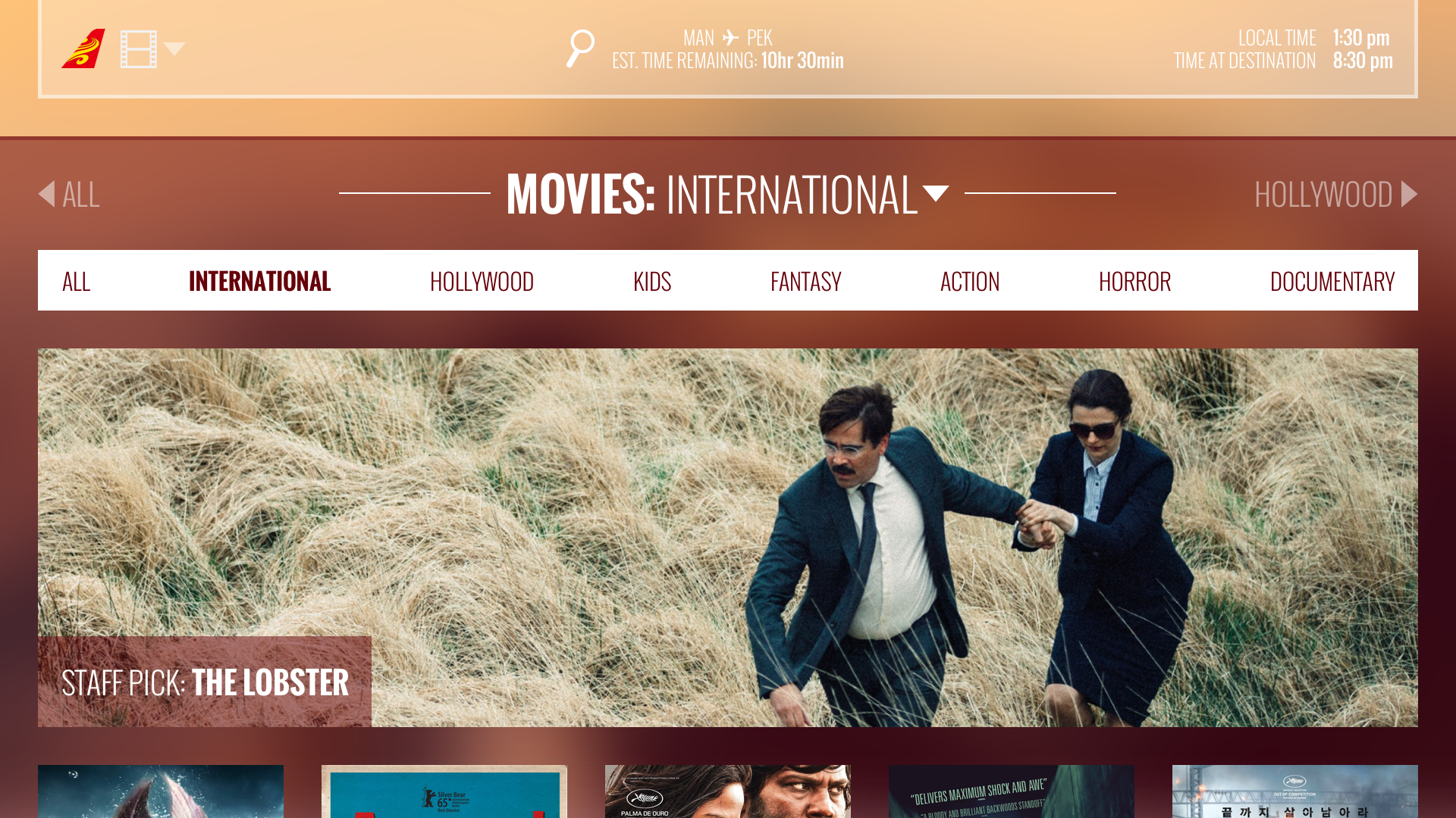 The movies page of the IFE, showing a hero image of the staff pick, 'The Lobster,' and the other movies listed below. Sorting is at the top.
